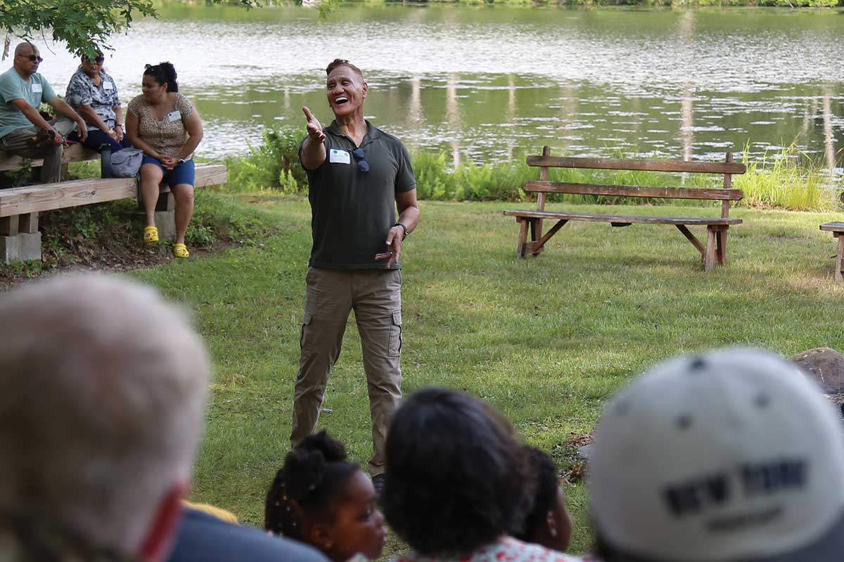 Alumnus Miguel Sanchez sharing at Mont Lawn Camp reunion